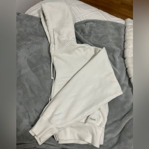 TNA white cropped zip up hoodie! Worn a few times! But in good condition